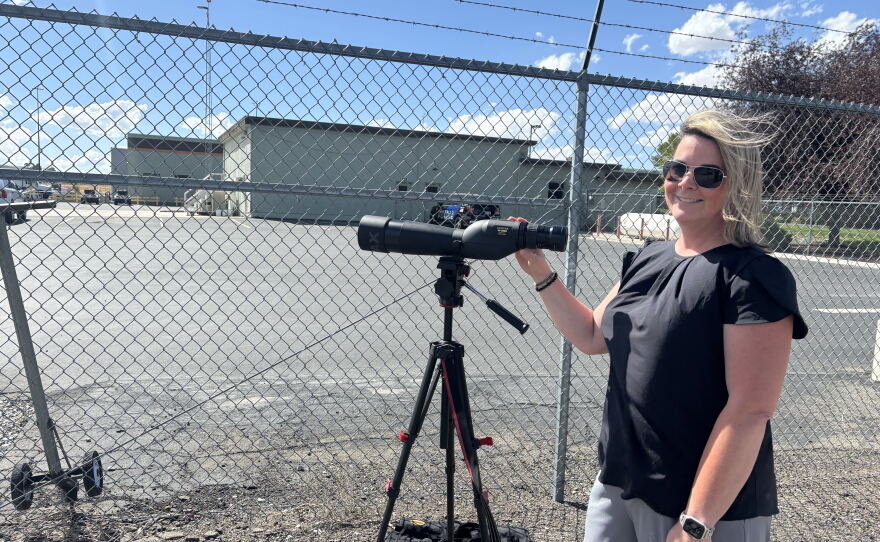 Heather Muth leads a small group of activists documenting twice-weekly ICE deportation flights.