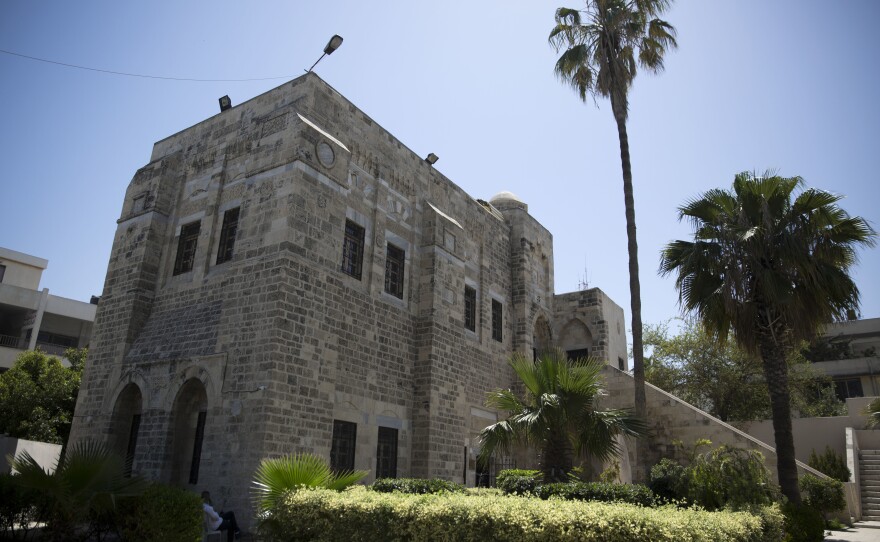 Palm trees grow in the garden of historical Pasha's Palace.