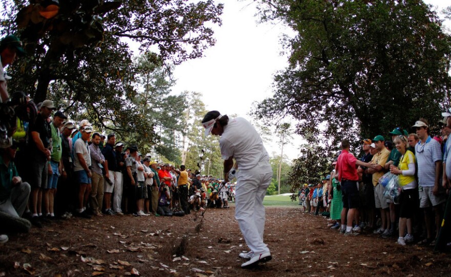 Bubba Watson hitting the hook that effectively won the Masters Tournament.
