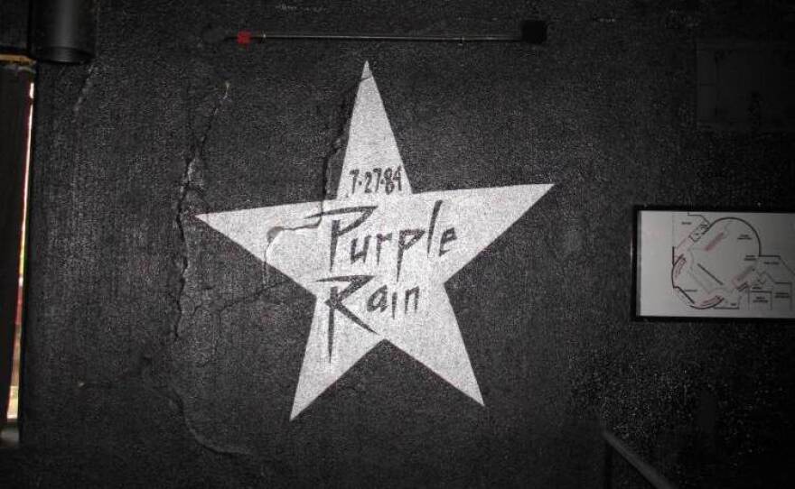 A star commemorating the filming of <em>Purple Rain </em>painted on the wall inside First Avenue.