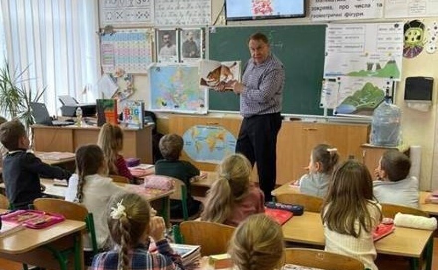 American Michael Sampson, a professor at St. John's University in New York, was spending the year in Ukraine as a teacher and a researcher. As Russia prepared to invade, he went to Poland. He's now assisting Ukrainians fleeing their homeland for Poland.