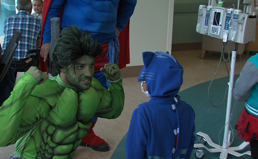 A superhero window washer dressed as the Hulk at Rady Children's Hospital, October 31, 2017. 