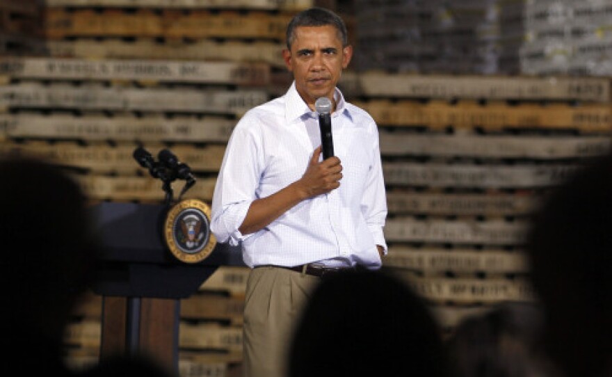 President Obama speaks Wednesday at a town hall-style meeting at Wyffels Hybrids Inc. in Atkinson, Ill. He is expected to unveil plans to stimulate the economy after Labor Day.