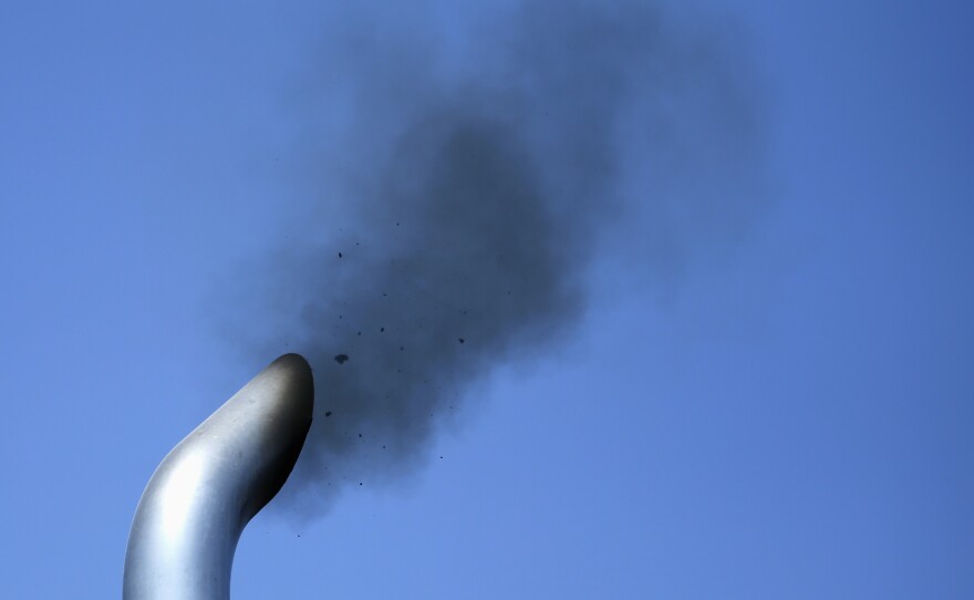 Exhausts rises from a truck in California last September.