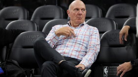 Los Angeles Clippers owner Steve Ballmer sits on the sideline before an NBA basketball game against the Chicago Bulls on March 13, 2026, in Inglewood, Calif.