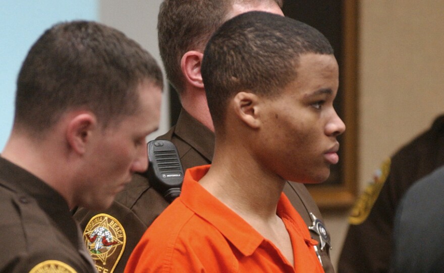 Lee Boyd Malvo, pictured in 2003, listens to court proceedings during the trial of fellow sniper suspect John Allen Muhammad in Virginia Beach, Va.