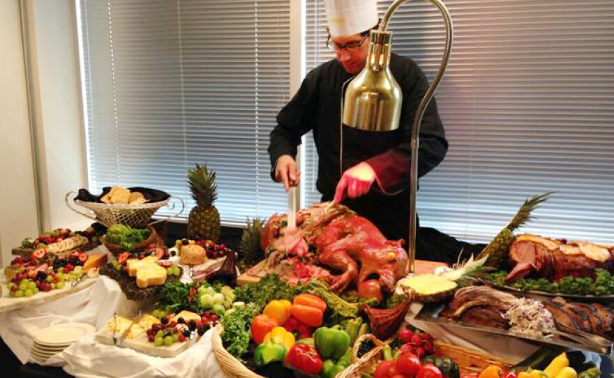 Ari Dvorin was hired in May as the first corporate chef at SpareFoot, a startup in Austin, Tex. Here, Dvoring cuts suckling pig for a mockumentary SpareFoot made.