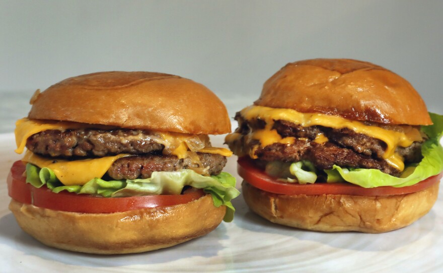 An Impossible Burger, left, and a Cali Burger, from Umami Burger. A new era of meat alternatives appeared on restaurant menus and grocery story shelves in 2019.