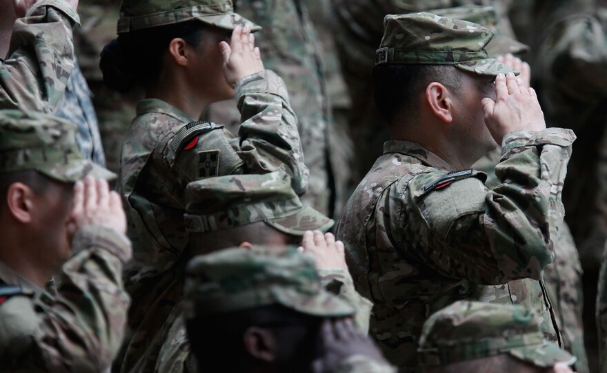 Soldiers of the U.S. Army V Corps conduct a color casing ceremony to mark the departure of V Corps headquarters from Europe on May 10, 2012, at the U.S. Army base in Wiesbaden, Germany.
