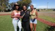 Jazzay Buncom, Diamond Brandon and Lucie Cishugi (left to right) hold red burgundy okra and black-eyed pea seeds at S&S Friendly Ranch on Feb. 27, 2026.