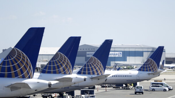 In this July 18, 2018, file photo, United Airlines commercial jets sit at a gate at Terminal C of Newark Liberty International Airport in Newark, N.J.