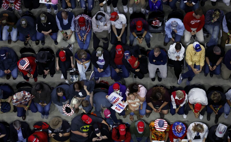 Supporters of Republican presidential candidate and former President Donald Trump attend a campaign rally at the Forum River Center March 9 in Rome, Georgia.
