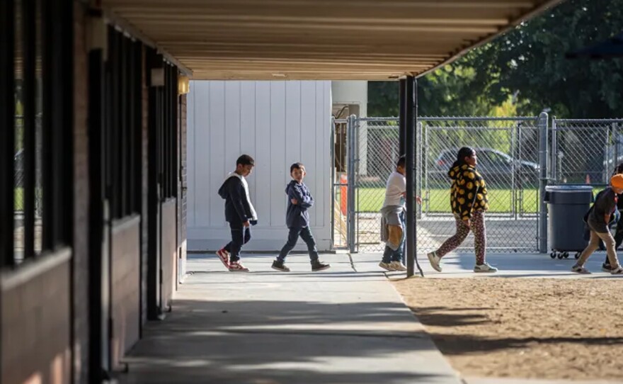 Students walk through campus at Madison Elementary School in Madera on Oct. 30, 2024. The school opened a dual language program in 2017.