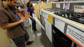 Customers shop for kitchen appliances at a Home Depot store in the Hollywood section of Los Angeles.