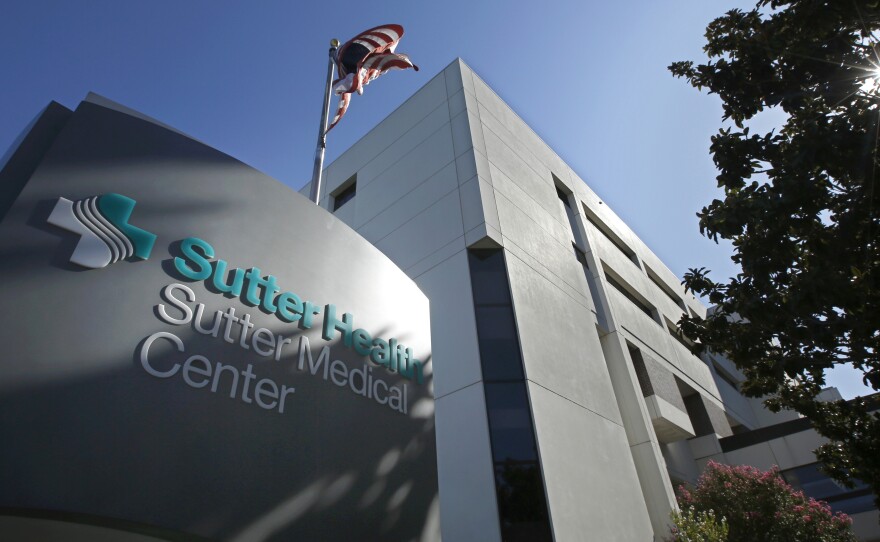 California Attorney General Xavier Becerra, along with 1,500 self-funded health plans, sued Sutter Health for antitrust violations. The closely watched case, which many expected to set precedents nationwide, ended in a settlement Wednesday. Above, Sutter Medical Center in Sacramento, Calif.