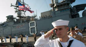 Sailors and Marines render a hand salute as the multi-purpose amphibious assault ship USS Makin Island (LHD 8) passes the USS Arizona Memorial. Makin Island and embarked Marines assigned to the 11th Marine Expeditionary Unit are deployed to the U.S. 3rd Fleet Area of operations. 