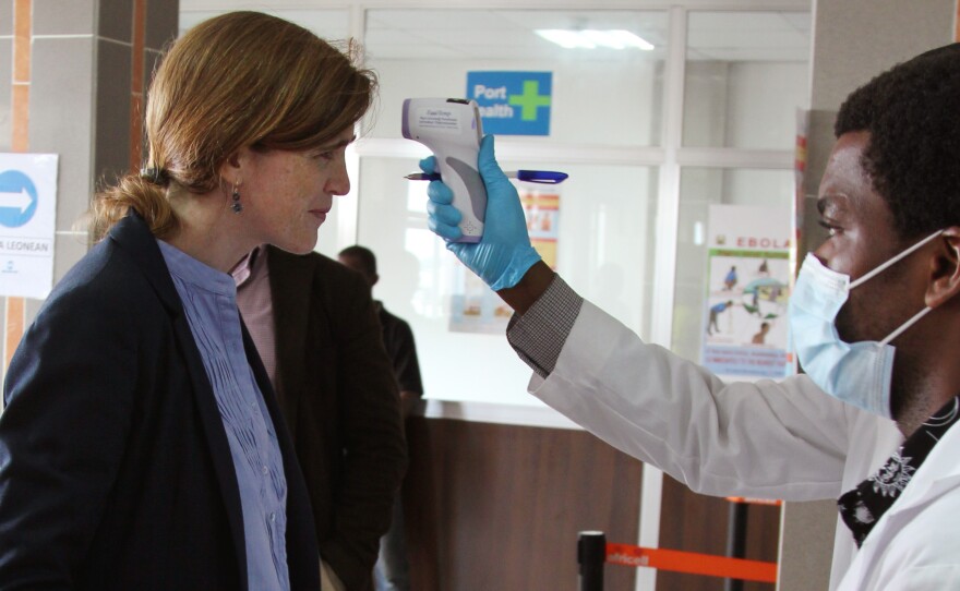 U.S. Ambassador to the United Nations, Samantha Power, has her temperature taken as she arrives in Freetown, Sierra Leone, on Monday. Power is on a visit to West Africa to get a first-hand look at the global response to the epidemic.