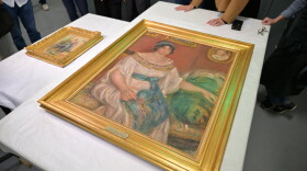 Recovered paintings "Portrait of Madame Colonna Romano", right, and "Young Woman at the Well," stolen from the Renoir Museum in Cagnes-sur-Mer are on display at the Interdisciplinary Centre for the Conservation and Restoration of Heritage in Marseille, France, Monday Oct. 12, 2026.