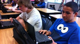 Dillon Stanton, 14 (left), and Richard Gonzalez, 14, use their netbooks in Rick Selby's eighth grade United States History class on April, 13, 2010.