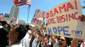 Immigrant-rights activists march up Broadway in the annual May Day rally in downtown Los Angeles on May 1.