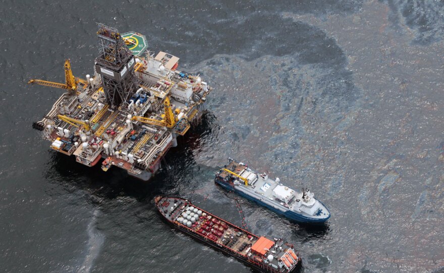 Workboats operate near the Transocean Development Drilling Rig II at the site of the Deepwater Horizon incident in the Gulf of Mexico on Friday.