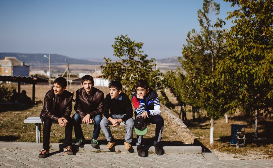 Young Crimean Tatars in the small village of Bakchisarai are members of a Muslim minority that was long persecuted by the Soviet Union. Many Tatars are concerned now that Moscow is once again in control.