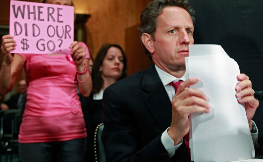 A year ago, TARP was a clear villain -- as when this protester appeared on Capitol Hill when Treasury Secretary Timothy Geithner was preparing to testify. Many in the news media haven't caught up with the more recent better news about the program.