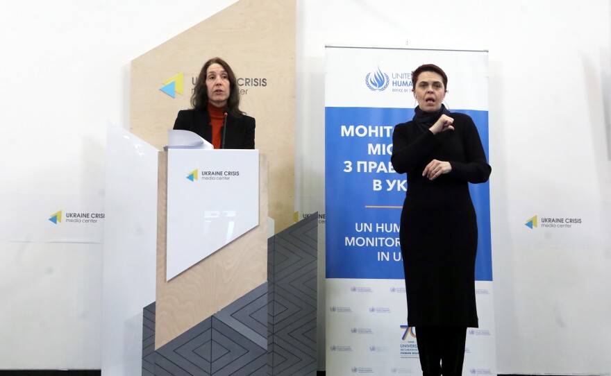 Head of the U.N. Human Rights Monitoring Mission in Ukraine, Matilda Bogner (left), presents a report at the Ukraine Crisis Media Center, in Kyiv, Ukraine.