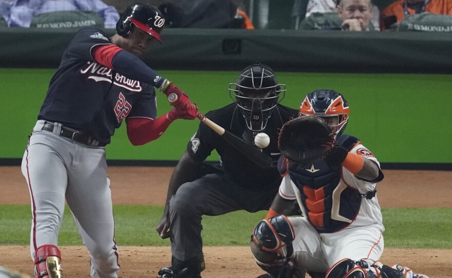 Washington Nationals' Juan Soto hits a home run during the fourth inning of Game 1 of the World Series against the Houston Astros on Tuesday.