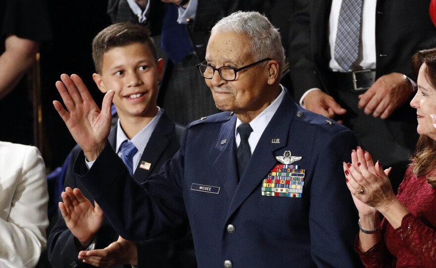 Tuskegee Airman Charles McGee and his great grandson Iain Lanphier are seen during President Donald Trump's State of the Union address on Feb. 4, 2020. McGee, one of the last surviving Tuskegee Airmen, who flew 409 fighter combat missions over three wars, died Sunday.