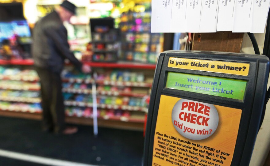 A ticket checking machine inside the store in Merrimack, N.H., where a $560 million Powerball ticket was sold in January. The winner claimed the prize on Wednesday via a trust. A court will decide whether she is allowed to remain anonymous.