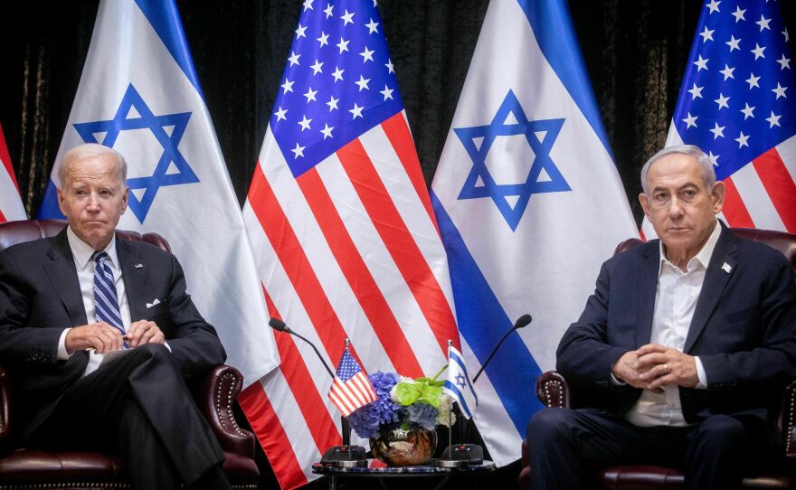President Biden sits with Israeli Prime Minister Benjamin Netanyahu, at the start of the Israeli war cabinet meeting, in Tel Aviv on Oct. 18, 2023.