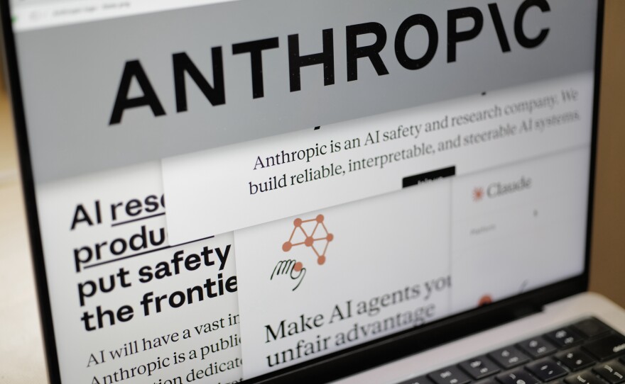 Pages from the Anthropic website and the company's logo are displayed on a computer screen in New York on Thursday, Feb. 26, 2026.