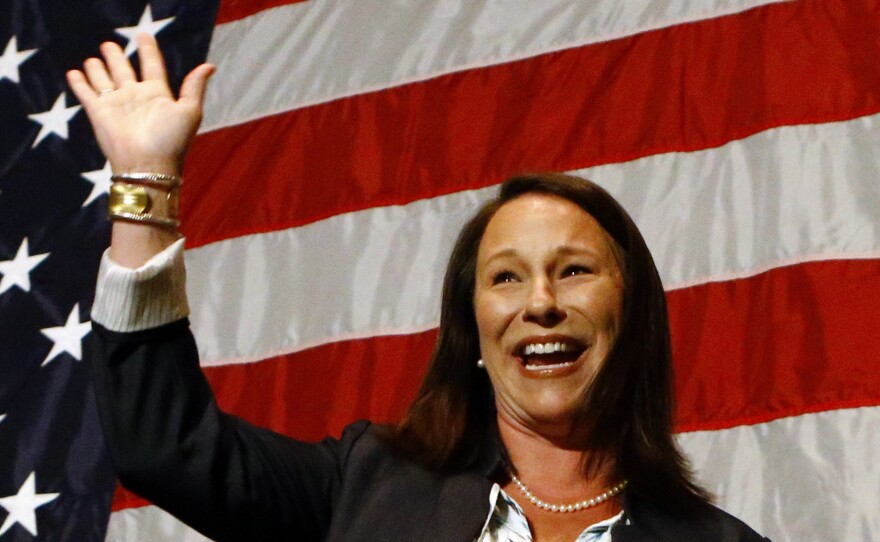 Alabama Rep. Martha Roby waves to supporters during the watch party in Montgomery, Ala., as she wins the runoff election on Tuesday.