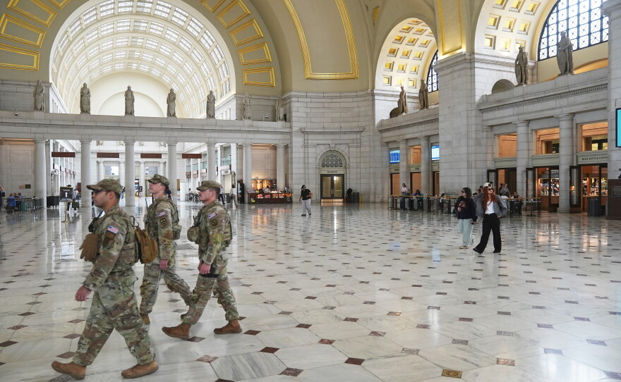 National Guard troops patrol Union Station in May.