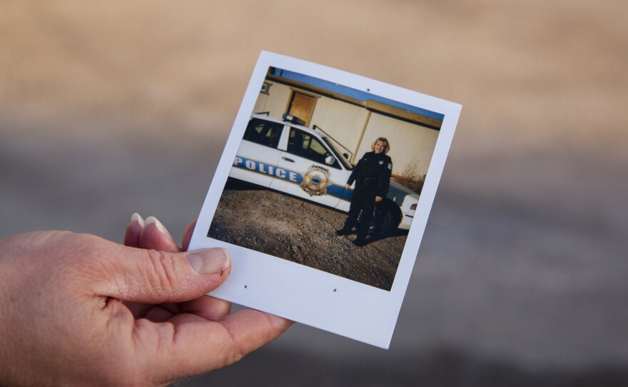 A Polaroid picture of Melanie Keener on her first day as a police officer. Keener began her law enforcement career nearly 20 years ago, but after reporting her boss for sexual harassment, she feels as though she will no longer be able to continue a career in law enforcement.