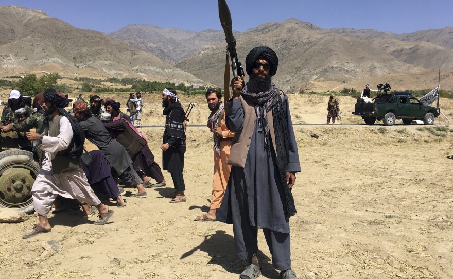 Taliban soldiers stand guard in Panjshir province northeastern of Afghanistan last September.