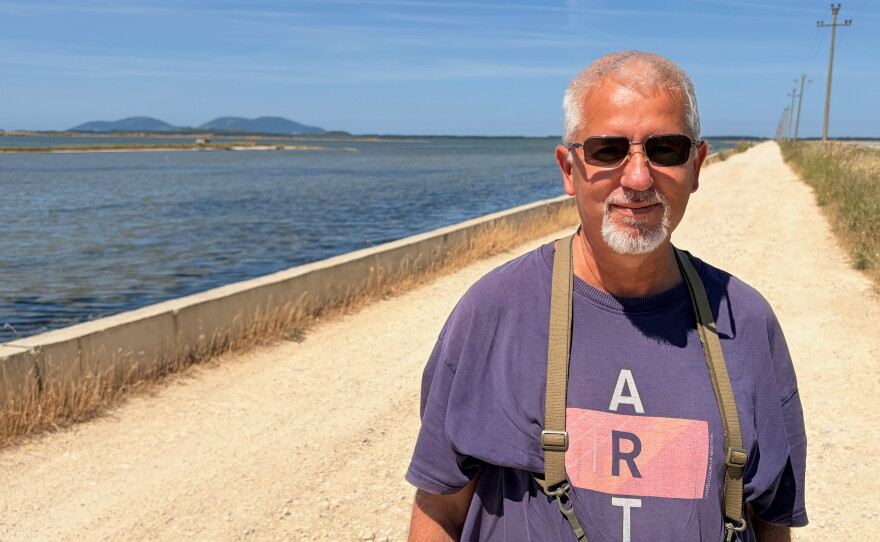 Ornithologist Taulant Bino, head of the Albanian Ornithological Society, has identified more than 250 bird species in Zvérnec, a protected coastal area where the government has approved construction of a luxury resort. He says plans to build along the beach and inland lagoon would destroy crucial habitats for birds and other animals.