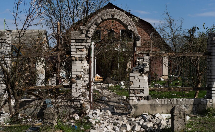 A damaged home in Moshchun, which is tucked into a forest just northwest of Ukraine's capital. Before the Russian invasion, it was a slice of pastoral suburbia, where urbanites had their country cottages and retirees built their dream homes for their golden years.