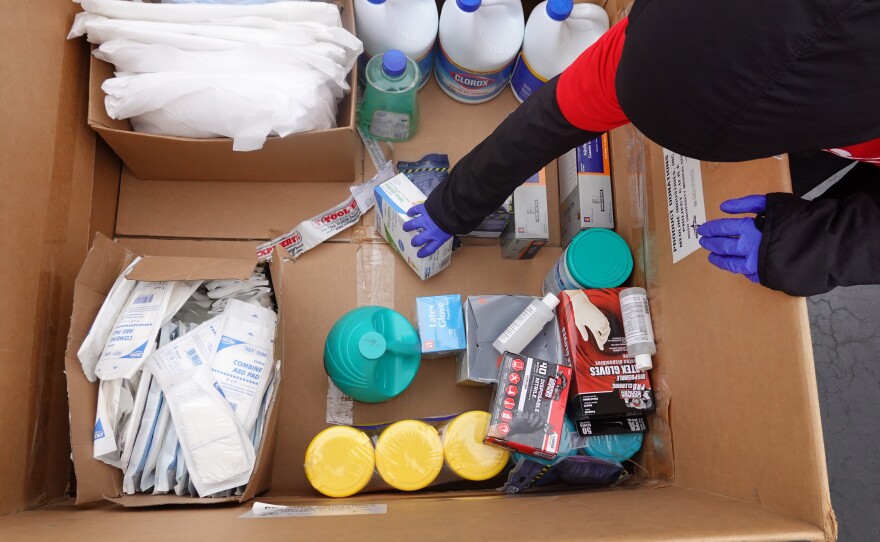 Staff and volunteers with Project CURE held a drive outside the United Center in Chicago to collect donations of personal protective equipment from the community that were then used to supply hospitals and clinics experiencing shortages on March 29.