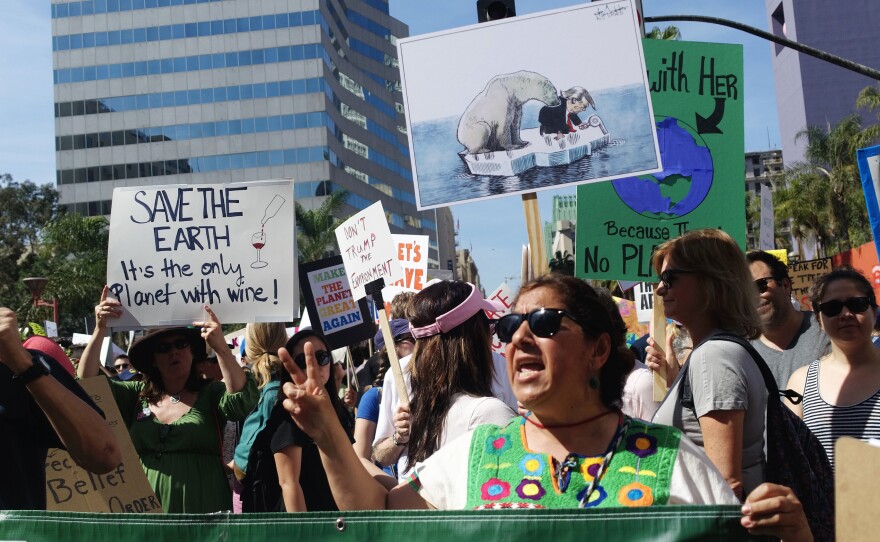 Yolanda Gonzalez, a sixth-grade teacher of Pomona, Calif., demonstrates as part of the March for Science in downtown Los Angeles on Saturday.