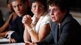 Tennis legend Billie Jean King (right), accompanied by White House Senior Adviser Valerie Jarrett and Education Secretary Arne Duncan, speaks at a June 2009 event marking the 37th anniversary of the enactment of Title IX. The landmark legislation bans sex discrimination in schools, whether  in academics or athletics.