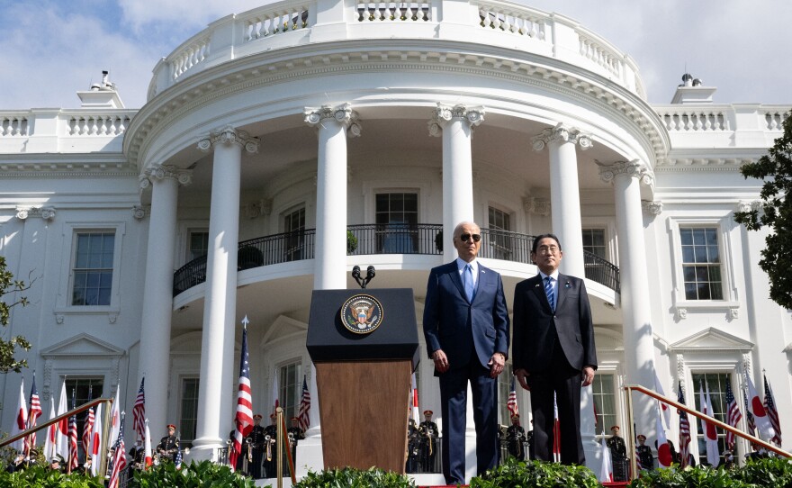 President Biden and Japanese Prime Minister Fumio Kishida stand together during a state visit ceremony at the White House.