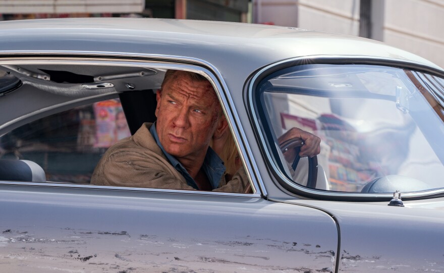 James Bond (Daniel Craig) and Dr. Madeleine Swann (Léa Seydoux) drive through Matera, Italy in "No Time To Die."