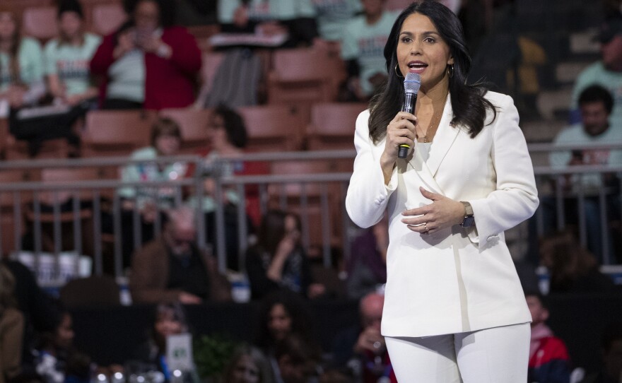 In this Feb. 8, 2020, file photo, Democratic presidential candidate Rep. Tulsi Gabbard, D-Hawaii, speaks during the McIntyre-Shaheen 100 Club Dinner in Manchester, N.H.
