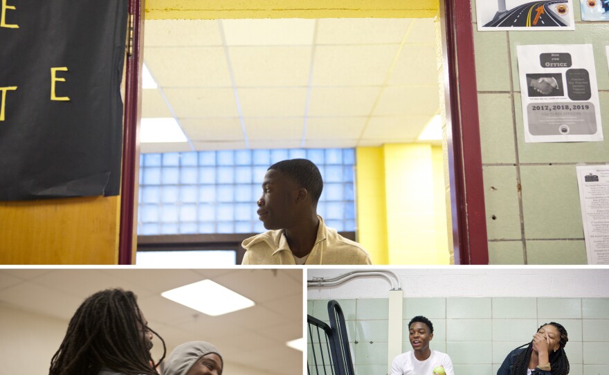 TOP: Student Dwayne Russell walks out of an office after checking in to start his day at school. RIGHT: Students Aaron Smith, 17 (left) and Lanaya Whittington, 16, interact in the gym during their lunch break. LEFT: Antwon Cooper embraces student Darian Bowers, 17, in the hallway.