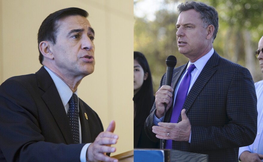Reps. Darrell Issa, left, and Scott Peters.