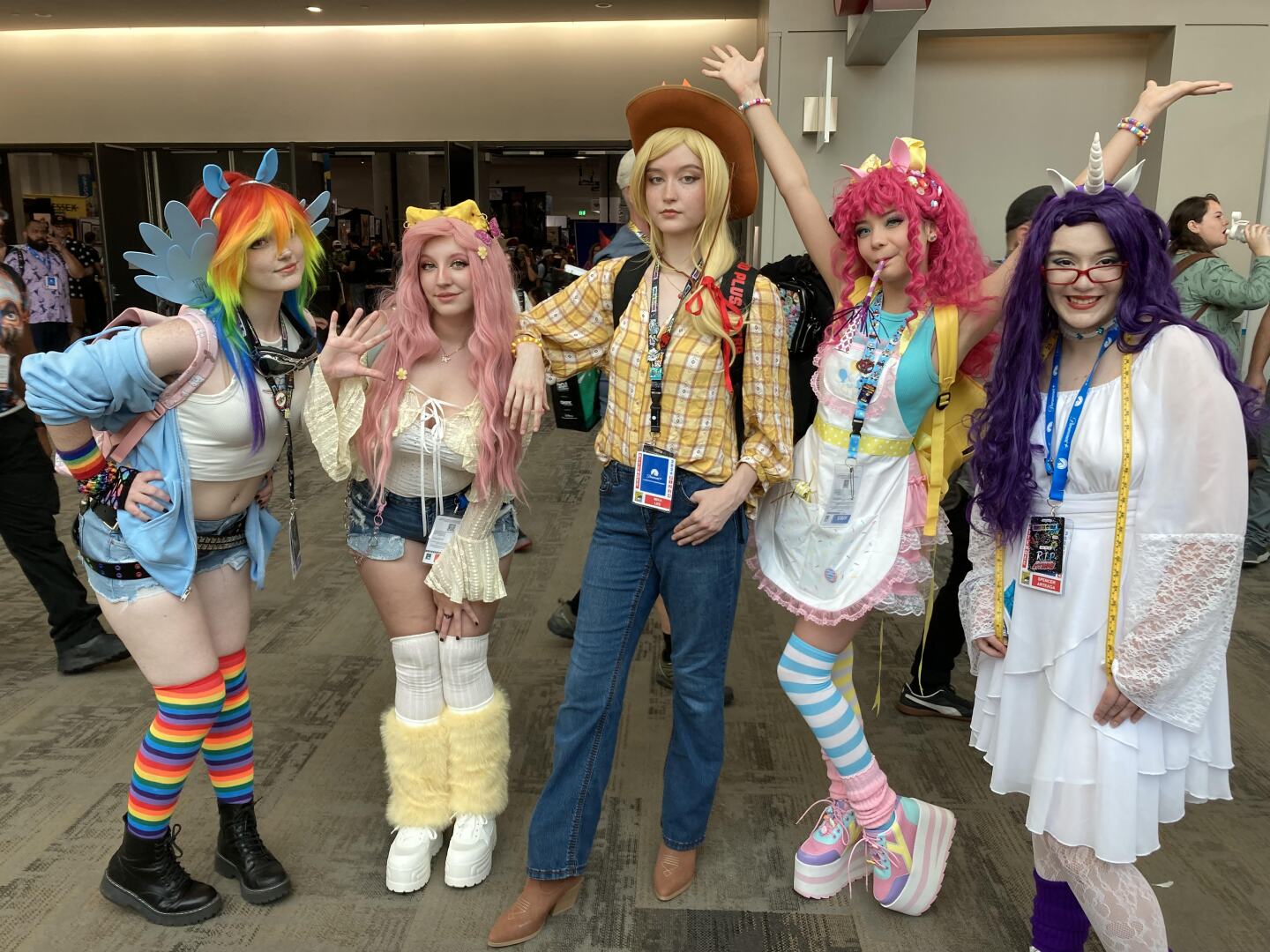 Comic-Con attendees pose dressed as human versions of "My Little Pony" on July 26, 2024.