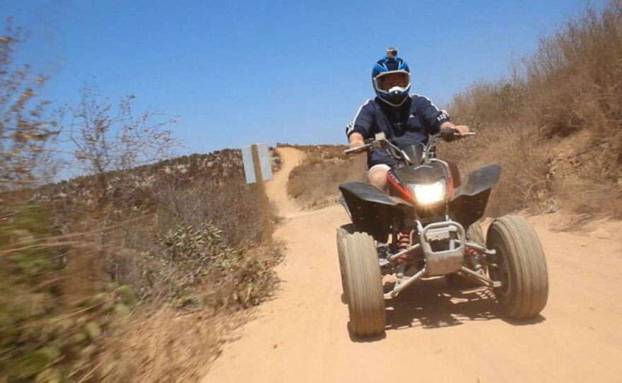 Host Jorge Meraz takes an ATV ride on mountain trails, Las Cañadas Campground.