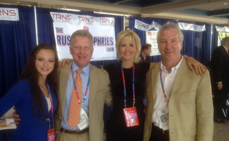 Conservative talk radio host Phil Valentine (right), pictured with his brother, Mark (second from left). Phil had been skeptical about COVID and the COVID vaccines, sometimes mocking them on his talk show. Earlier this year, he contracted the virus and died.